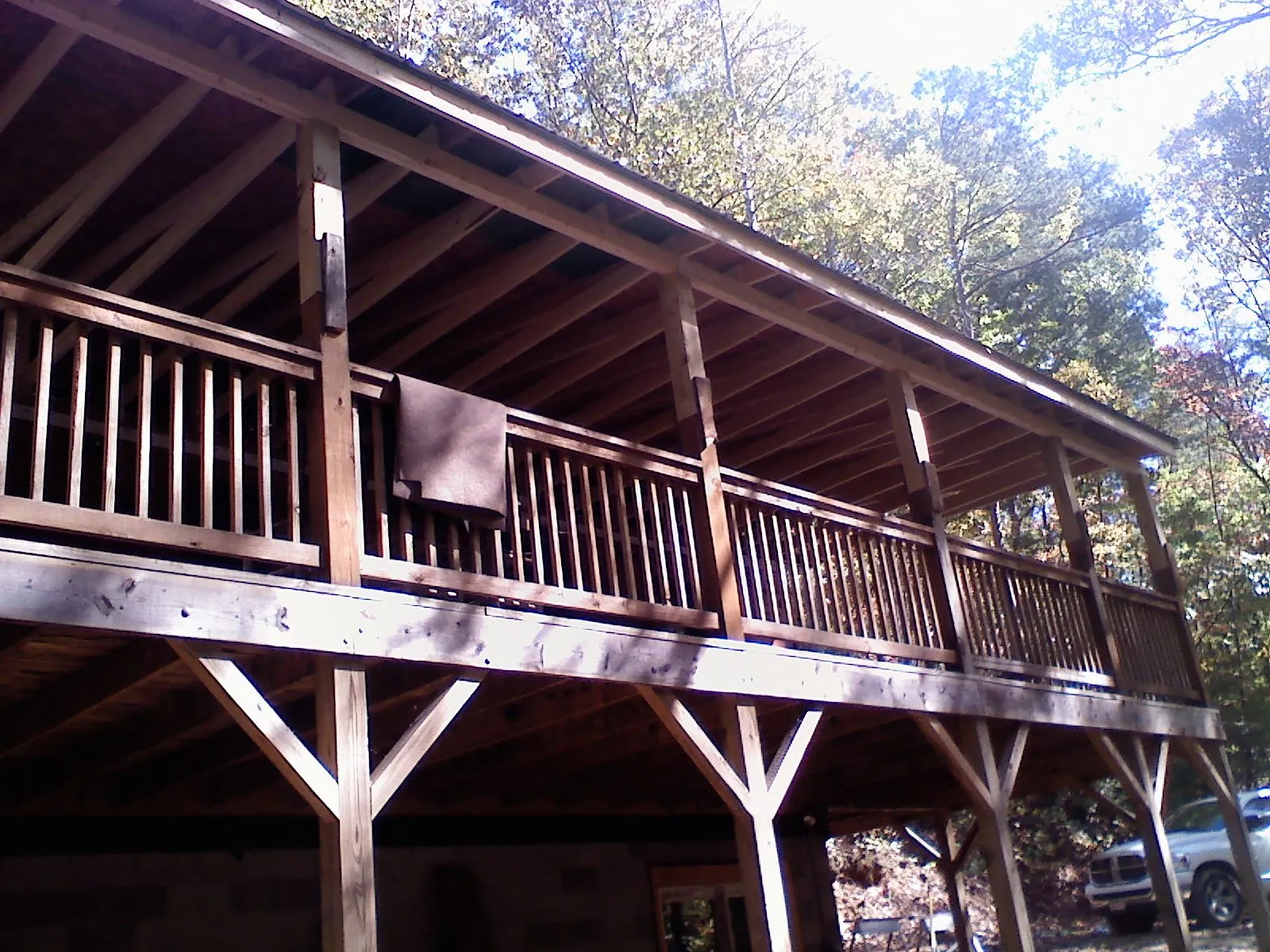Timber framing under a new elevated porch and deck — Roof Leak Repair in Belspring by Roofing Brothers